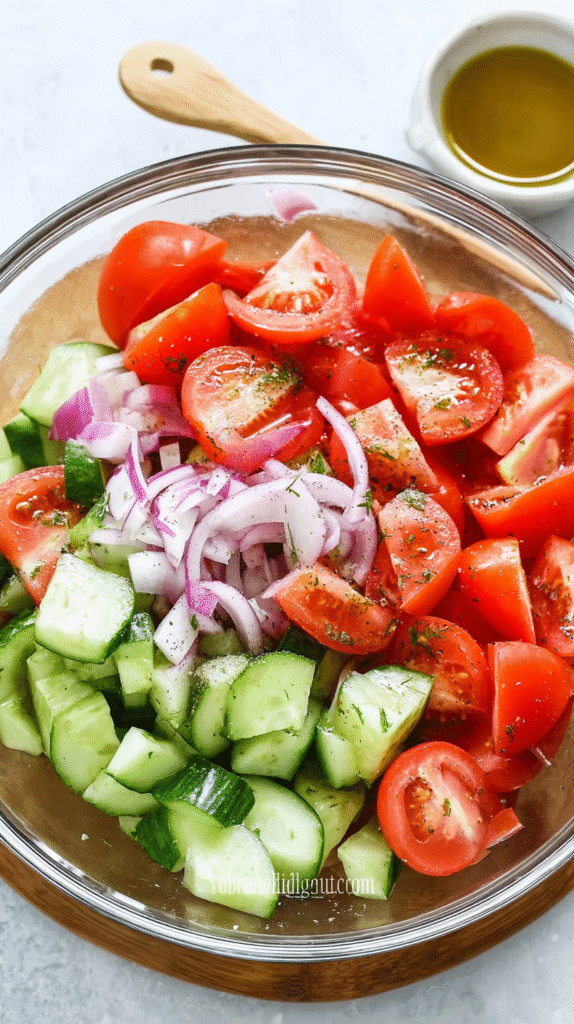 slicing cucumber and tomatoes for salad