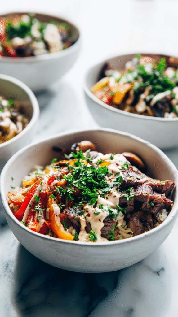 philly cheesesteak bowls served with rice and provolone cheese