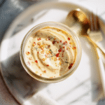 Tram Sauce in a jar with chili and herbs