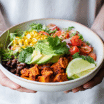 Sweet potato taco bowl on white ceramic plate