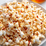 hot honey popcorn in a rustic bowl