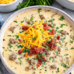 Keto Cheeseburger Soup being served on beautiful dinnerware