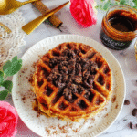 Keto Churro Chaffle with golden crust and churro topping