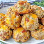 Keto Crack Sausage Balls hero shot with crispy bacon and melted cheese
